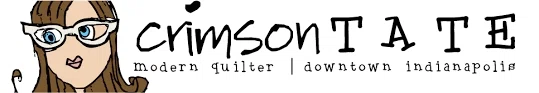Crimson Tate Merchant Logo