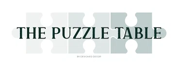 The Puzzle Table Merchant Logo