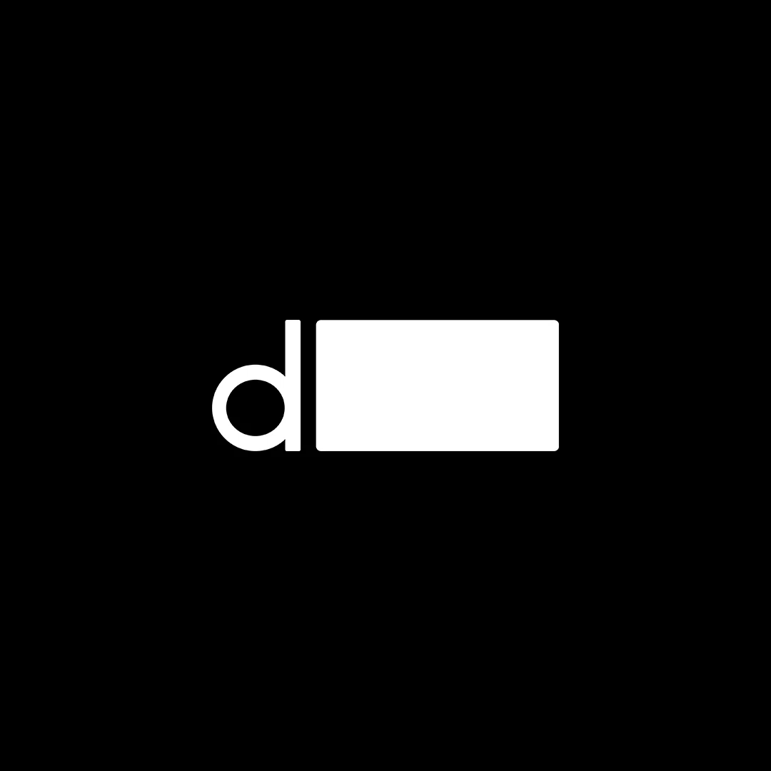The Desk Mat Merchant Logo