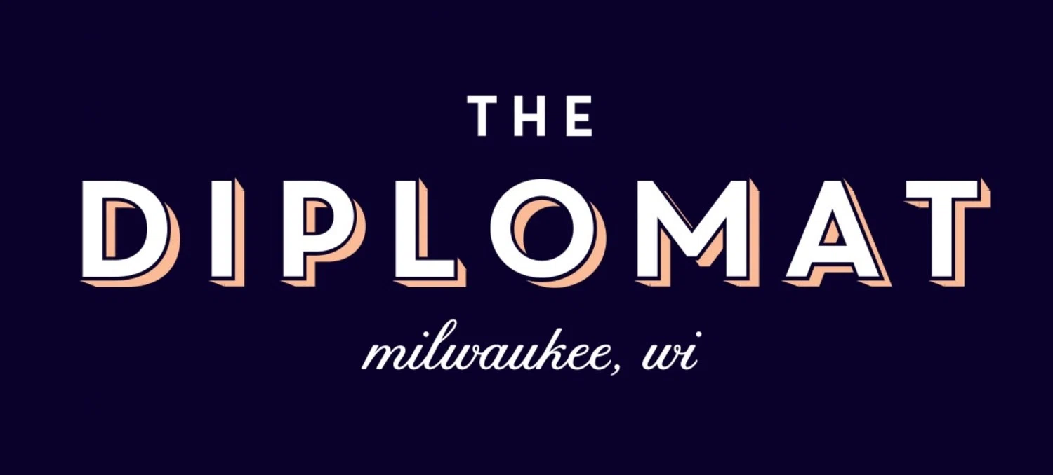 The Diplomat Merchant Logo